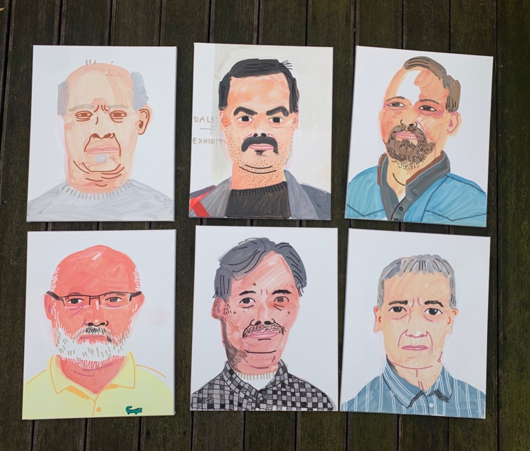 zdjęcie: Na podłodze leży 6 portretów mężczyzn - pracowników Zachęty